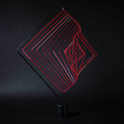 Square Wave Coral Red on a stand